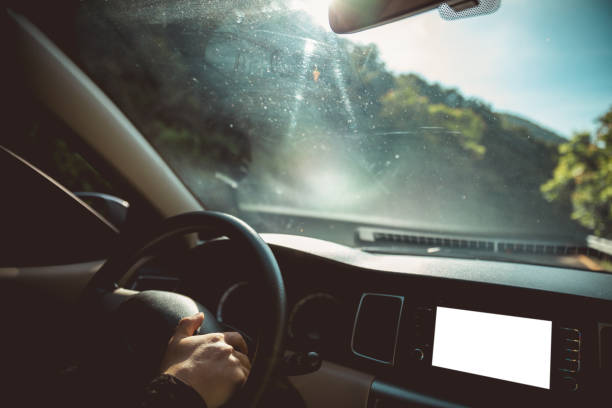 istock Driving a car on mountain trail 1255841708