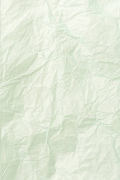 istock Old green recycle cardboard paper texture background 1255848494