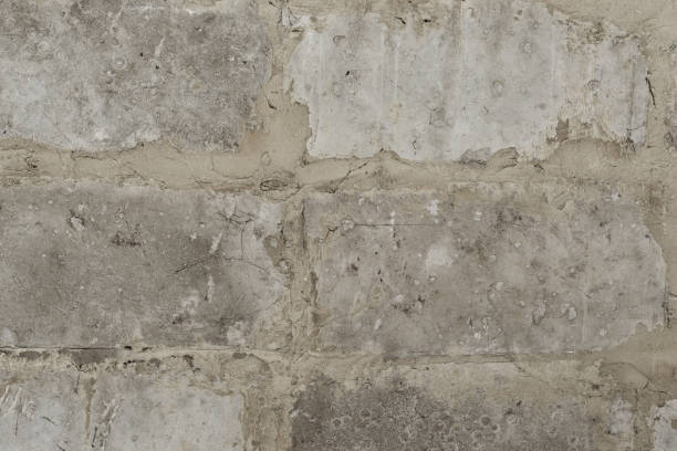 Close-up detail of old white brick wall.