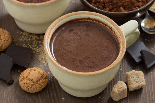 istock cup of hot chocolate and sugar cubes, top view 1255849538