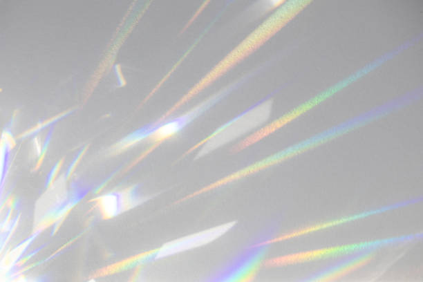blurred rainbow light refraction texture on white wall - holographic texture imagens e fotografias de stock