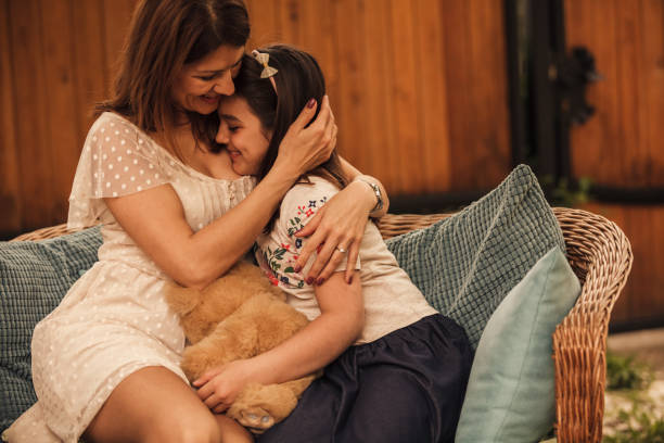 istock The coziest place is always mom's embrace 1255856416