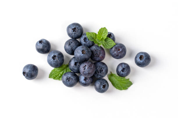 istock Blueberry fruit top view isolated on a white background, flat lay overhead layout with mint leaf, healthy design concept. 1255857119