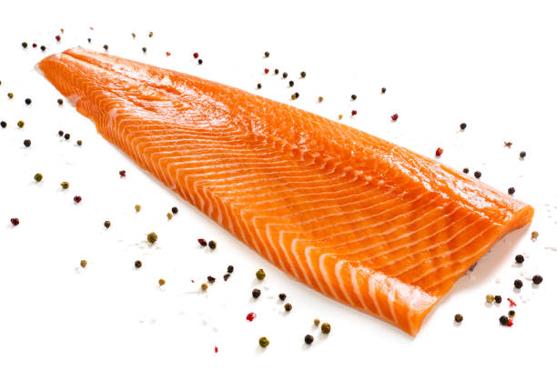 istock Fresh raw salmon fillet on white background 1255857239