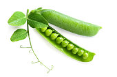 Fresh green peas pod with leaves isolated on white