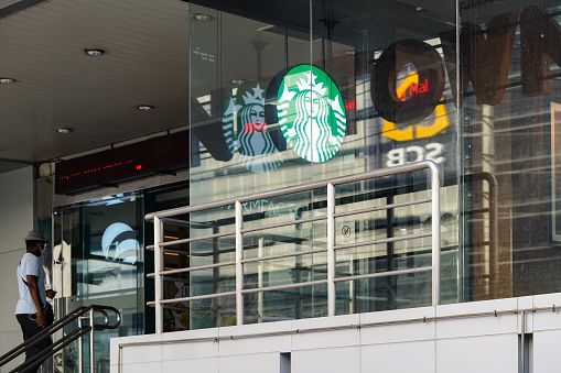 Bangkok, Thailand - 30 Apr 2020, The StarBucks retail still opens the light box logo in the COVID-19 period but It's out of any services and didn't clean mirror facade, Bangkok, Thailand.