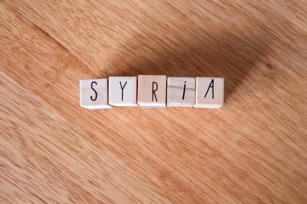 The Country Syria written on wooden cubes on wooden background, Country in the Middle East The Country Syria written on wooden cubes on wooden background, Country in the Middle East Arabic free syrian army stock pictures, royalty-free photos & images