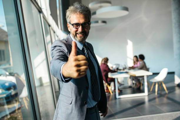 istock Happy Senior businessman inside modern office 1255859041