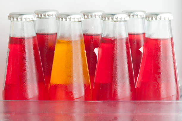 istock Row of single portion analcoholic aperitifs in the home refrigerator 1255868944
