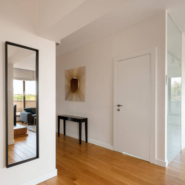 istock White corridor with wooden floor 1255869139