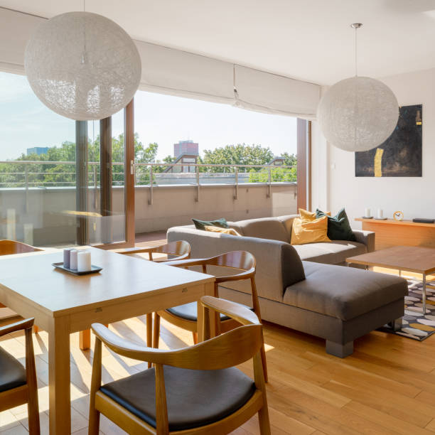 istock Living room with window open to terrace 1255869152