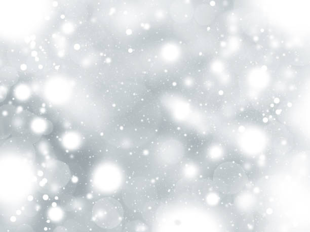 istock Abstract winter silver bokeh background with defocused circles 1255869535