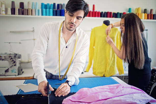 istock Fashion designer working in his studio 1255875370