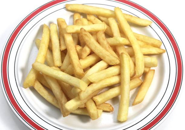 istock Plate with French Fries against White Background 1255880624