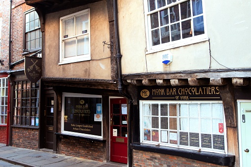 Monk Bar Chocolatiers at dawn, in The Shambles, York, North Yorkshire, England, on Sunday, 12th July, 2020.