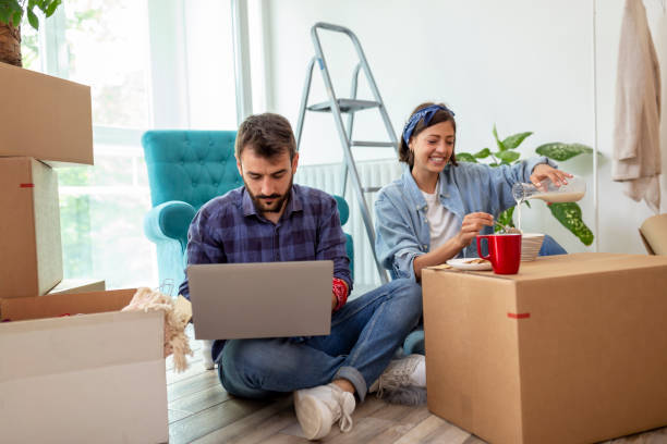 istock Couple having breakfast in their new home 1255885288