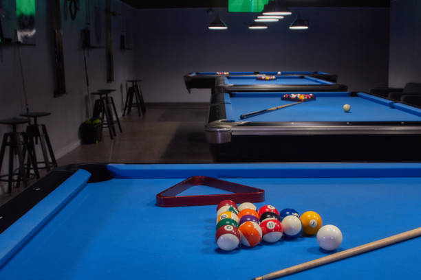 istock American Pool Billiard tables and balls 1255887062