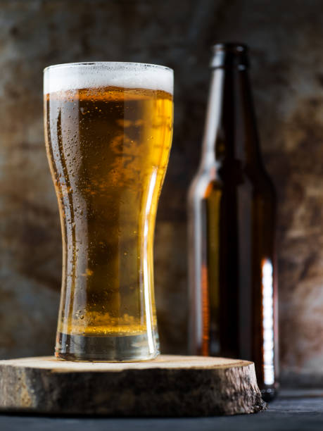istock A glass of light beer on a dark background 1255890391