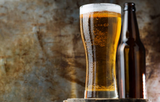 istock A glass of light beer on a dark background copy space 1255890395