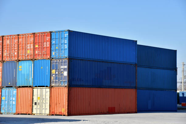 istock International Container Terminal. Cargo sea containers in port for shipping 1255891234