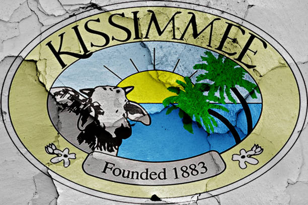 flag of Kissimmee painted on cracked wall flag of Kissimmee painted on cracked wall kissimmee stock pictures, royalty-free photos & images