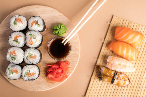 istock Composition with delicious nigiri sushi and rolls 1255895742