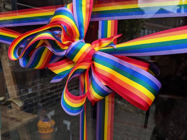 istock A rainbow coloured bow tied to a front door during Coronavirus lockdown 1255896008