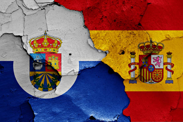 istock flags of Fuenlabrada and Spain painted on cracked wall 1255897498