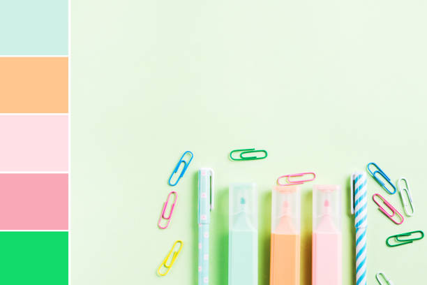istock Colorful stationery on mint green. Color swatch 1255898665