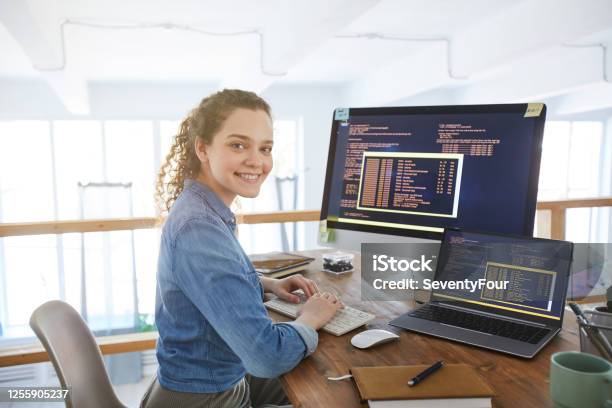 Female It Developer At Workplace Stock Photo - Download Image Now - Computer Programmer, Technology, Women