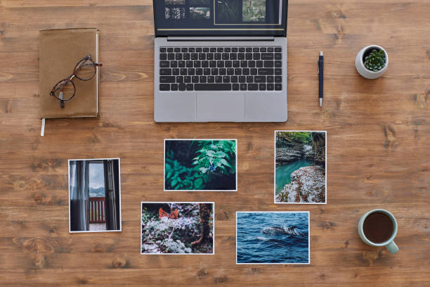 istock Travel Photographers Desk Top View 1255905304