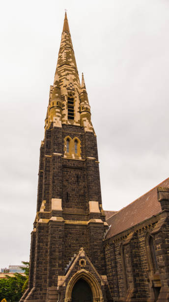 istock Tower and a spire - catholic church, gothic architecture. 1255905505