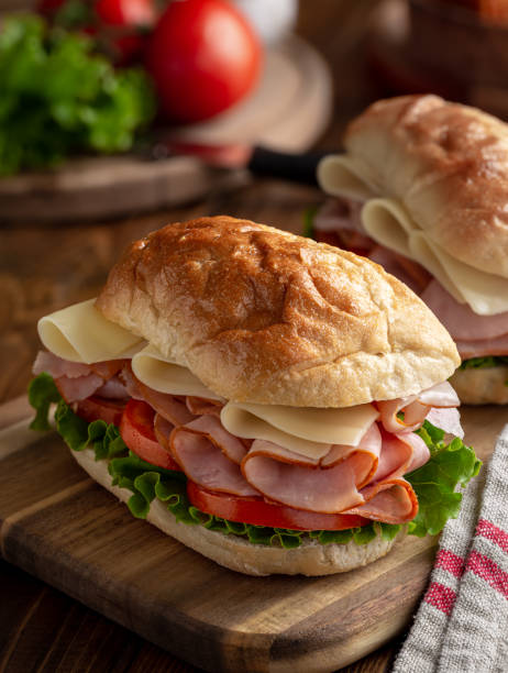 istock Sandwich with Ham, Cheese, Lettuce and Tomato 1255905799