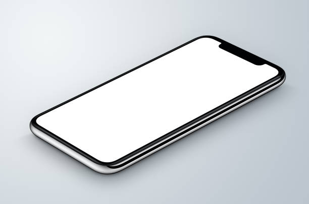 перспективный вид изометрического белого макета смартфона лежит на серой поверхности - withe flat screen computer monitor electronics industry стоковые фото и изображения