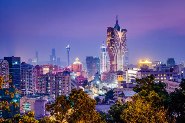 cityscape of macau city at twilight night architecture building cityscape of macau city at twilight night macao photos stock pictures, royalty-free photos & images
