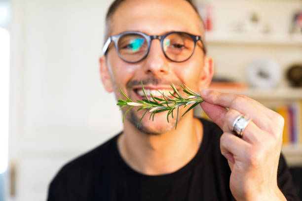 istock Happy man ready to cook smiling 1255907209