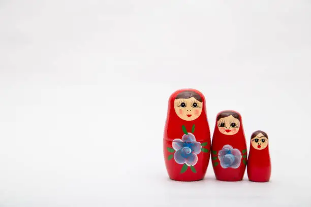 Photo of Matryoshka dolls, nesting dolls or Russian dolls handicraft made of wooden with beautiful flowers painted art