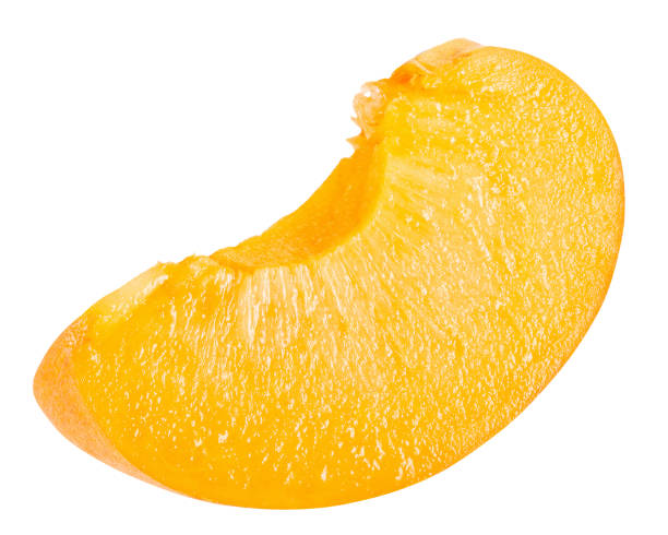 istock apricot slice isolated on a white background 1255910474