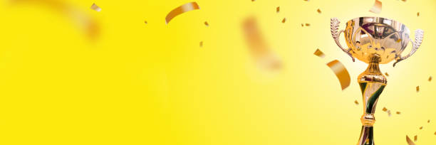 istock Trophy cup. Champion trophy, shiny golden cup. 1255917836