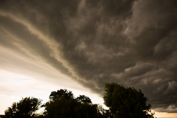 istock Stormy dark clouds before the storm. Textured gray and blue clouds in sky 1255917916