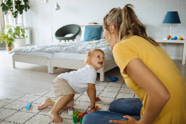 istock Mother and son playing with construction toys 1255918864