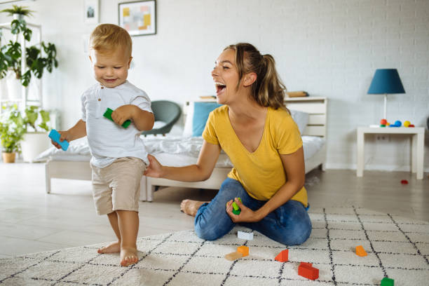istock Mother and son playing with construction toys 1255919061