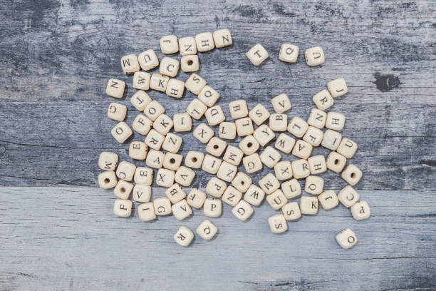 istock Block of alphabet studded on the floor 1255924700