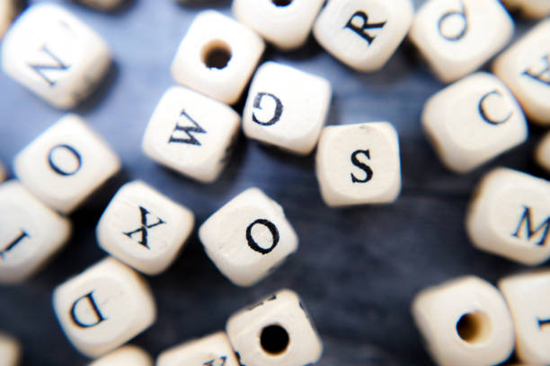 istock Block of alphabet studded on the floor 1255924740