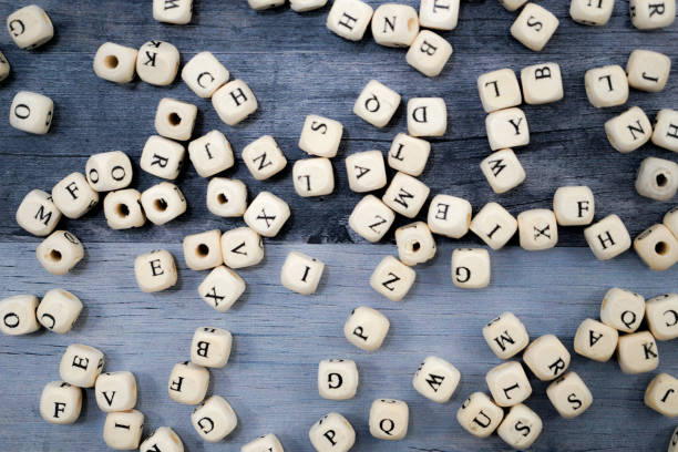 istock Block of alphabet studded on the floor 1255924841