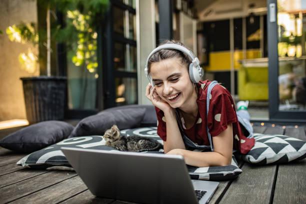 istock Young woman enjoying at home 1255924935