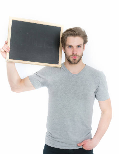 istock guy or handsome man holding blackboard isolated on white background 1255924939