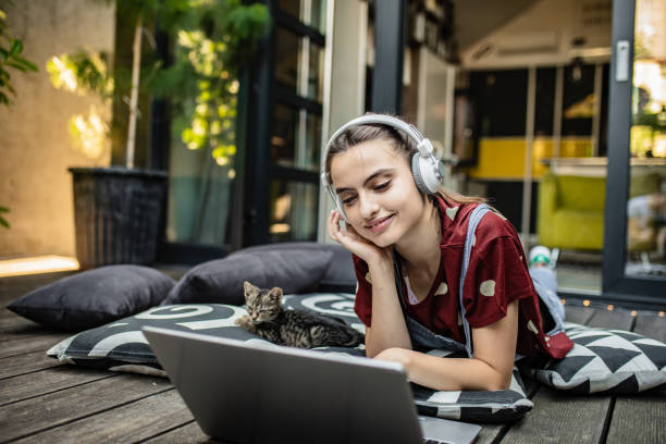 istock Young woman enjoying at home 1255924940
