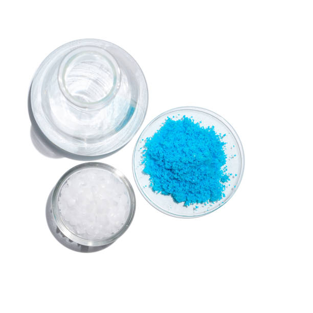 Cosmetic chemicals ingredient on laboratory table. Copper(II) sulfate, Microcrystalline wax, alcohol.