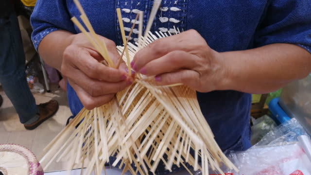 Woman Is Making A Basket By Hand Shot On Smart Phone